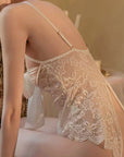 Open-back lace bodysuit with crotchless design.