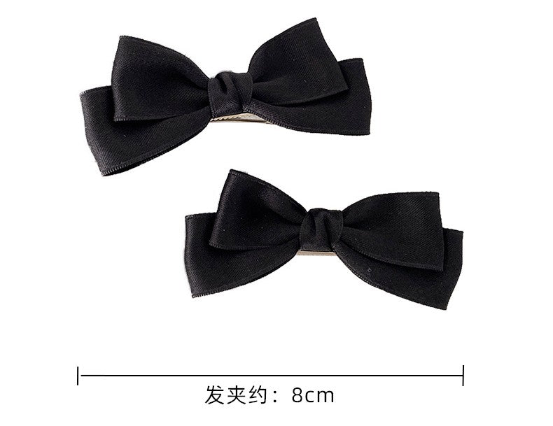 Black Bow Temperament Barrettes (1 Pair)